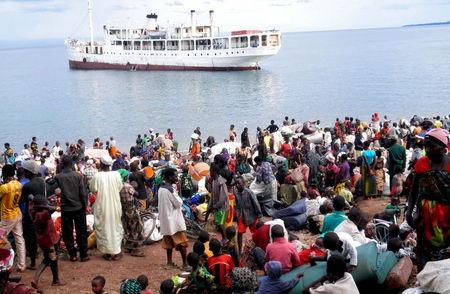 Burundian refugees wait at the shores of Lake Tanganyika in Kagunga village in Kigoma region, western Tanzania, as MV Liemba arrives to transport them to Kigoma township, May 9, 2015. PHOTO BY REUTERS/Stringer