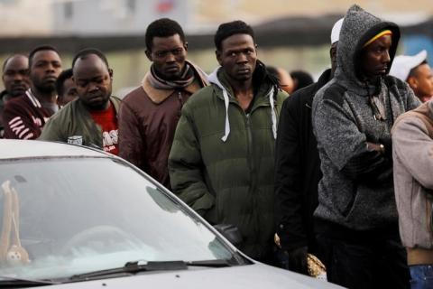 African migrants wait in line for the opening of the Population and Immigration Authority office in Bnei Brak, Israel, February 4, 2018. PHOTO BY REUTERS/Nir Elias