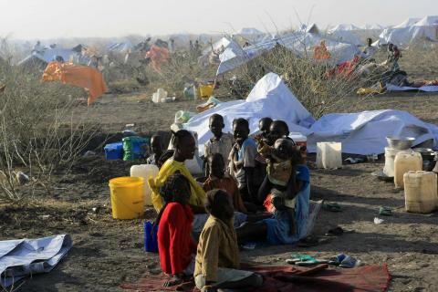 South Sudanese refugees wait inside a camp 10 km (6 miles) from al-Salam locality at the border of Sudan's White Nile state, after arriving from Malakal and al-Rank war zones within South Sudan