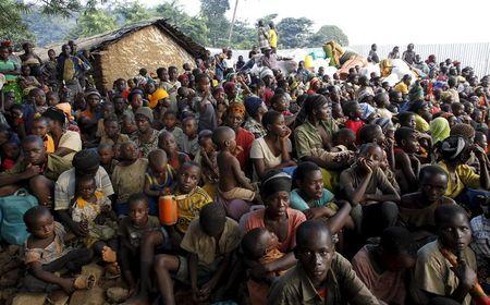 Burundian refugees gather on the shores of Lake Tanganyika in Kagunga village in Kigoma region in western Tanzania, as they wait for MV Liemba to transport them to Kigoma township, May 17, 2015. PHOTO BY REUTERS/Thomas Mukoya