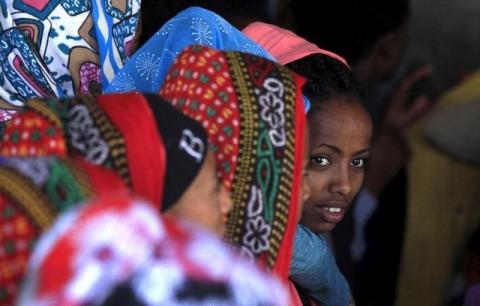 Eritrean refugees wait to get registered on arrival at Indabaguna refugee reception and screening center in Tigrai region near the Eritrean border in Ethiopia, February 9, 2016. PHOTO BY REUTERS/Tiksa Negeri