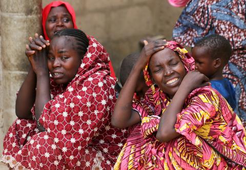 Relatives of missing school girls react in Dapchi in the northeastern state of Yobe. PHOTO BY REUTERS/Afolabi Sotunde