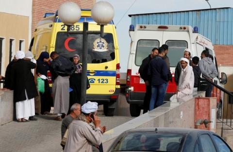 Relatives of victims of the explosion at the Al Rawdah mosque, wait near past ambulances outside Suez Canal University hospital in Ismailia, Egypt, November 25, 2017. PHOTO BY REUTERS/Amr Abdallah Dalsh