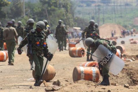 Riot policemen deploy after demonstrators supporting opposition leader Raila Odinga, burned tyres after their political leader claimed "massive" fraud in this week's elections, in Kisumu, Kenya, August 9, 2017. PHOTO BY REUTERS/James Keyi