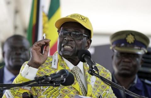 Zimbabwe's President Robert Mugabe addresses supporters at the on going elective congress in Harare, December 4, 2014. PHOTO BY REUTERS/Philimon Bulawayo