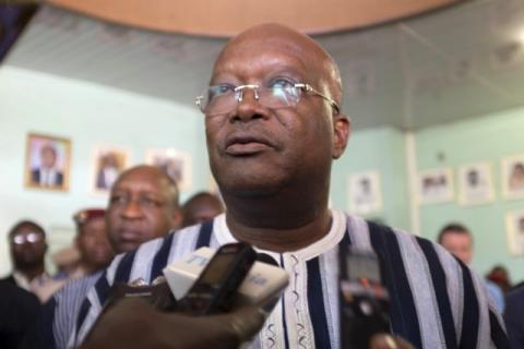 Burkina Faso President Roch Marc Kabore speaks to journalists at the site of an attack in Ouagadougou, Burkina Faso, January 16, 2016. PHOTO BY REUTERS/Stringer