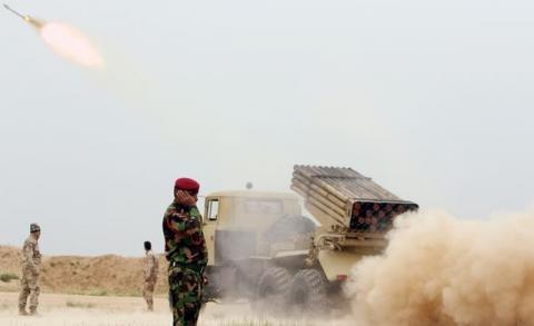 Iraqi soldiers fire a rocket toward Islamic State militants on the outskirts of the Makhmour south of Mosul, Iraq, March 25, 2016. PHOTO BY REUTERS/Azad Lashkaril