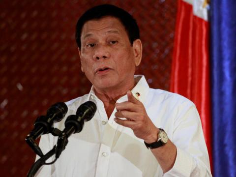 Philippine President Rodrigo Duterte gestures while addressing families of the 44 Philippine National Police-Special Action Force (PNP-SAF) members who were killed in a 2015 police operation, during a dialouge at the presidential palace in Manila, Philippines, January 24, 2017. PHOTO BY REUTERS/Czar Dancel