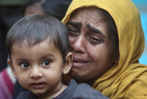 A Rohingya Muslim woman cries as she holds her daughter after they were detained by Border Security Force (BSF) soldiers while crossing the India-Bangladesh border from Bangladesh, at Raimura village on the outskirts of Agartala, January 22, 2019. PHOTO BY REUTERS/Jayanta Dey