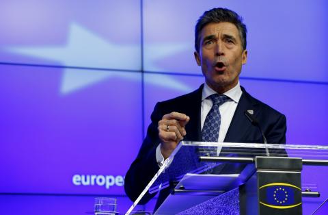 NATO Secretary General Anders Fogh Rasmussen holds a news conference while taking part in a European Union leaders summit at the EU council headquarters in Brussels