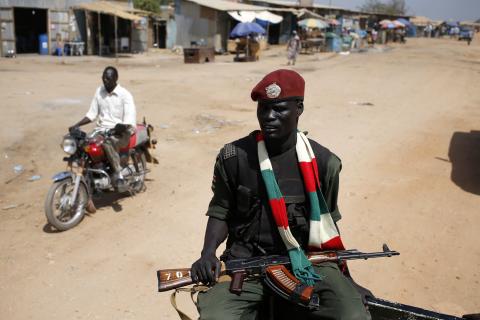 An SPLA soldier drives in a vehicle in Juba