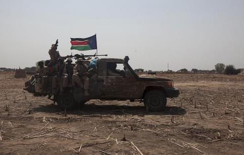 SPLA soldiers drive to the frontline at Mathiang from their military base in Bor, South Sudan