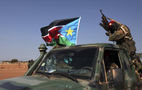 SPLA soldiers are pictured on a pick-up truck in Bentiu, in Unitiy state