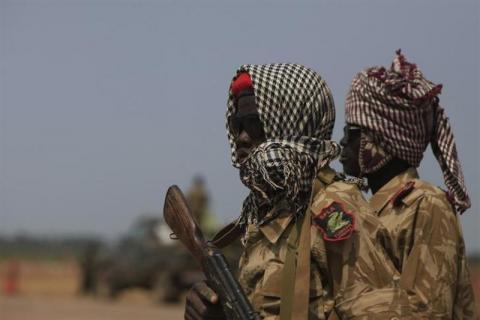 Sudan People's Liberation Army (SPLA) soldiers guard the airport in Malakal