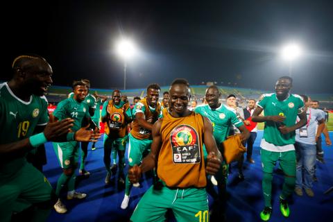 Senegal's Sadio Mane and teammates celebrate after the match. PHOTO BY REUTERS/Mohamed Abd El Ghany