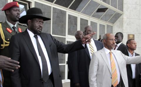 South Sudan's President Salva Kiir Mayardit (L) gestures as he leaves after attending peace talks with the South Sudanese rebels in Ethiopia's capital Addis Ababa, March 6, 2015. PHOTO BY REUTERS/Tiksa Negeri