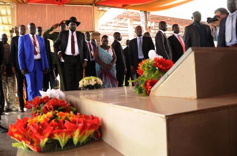 South Sudan's President Salva Kiir (front 2nd L) and senior members of his government pay their respects to the late Sudanese liberation hero John Garang at John Garang's Mausoleum in the capital Juba March 18, 2015, before addressing a rally on the peace talks process with South Sudan's rebel leader Riek Machar. PHOTO BY REUTERS/Jok Solomun