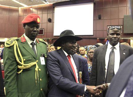 South Sudan's President Salva Kiir (C) arrives during a peace signing meeting attended by leaders from the region in Ethiopia's capital Addis Ababa, August 17, 2015. PHOTO BY REUTERS/Tiksa Negeri