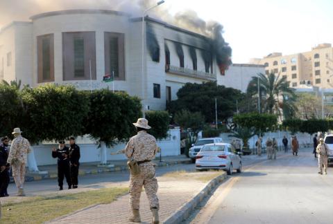 Security forces stand around the headquarters of Libya's foreign ministry after a suicide attack in Tripoli, Libya, December 25, 2018. PHOTO BY REUTERS/Hani Amara