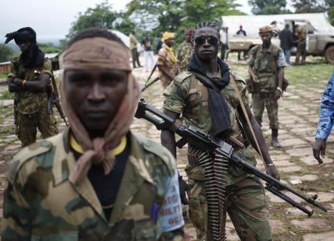 Seleka fighters stand in their base before a mission in the town of Lioto June 9, 2014. PHOTO BY REUTERS/Goran Tomasevic