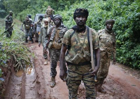 Seleka General Zakariya Isa Chamchaku patrols with other fighters as they search for Anti-Balaka Christian militia members near town of Lioto