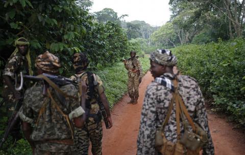 Seleka fighters patrol as they search for Anti-Balaka Christian militia members near the town of Lioto. PHOTO BY REUTERS/Goran Tomasevic