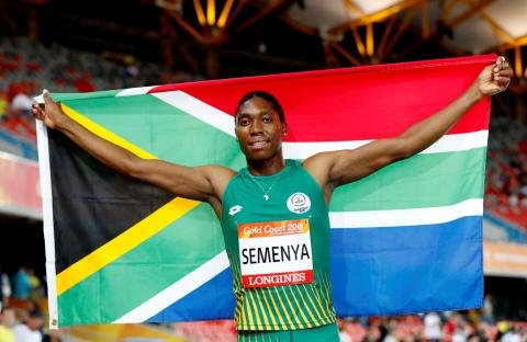 Gold medalist Caster Semenya of South Africa celebrates. PHOTO BY REUTERS/Paul Childs