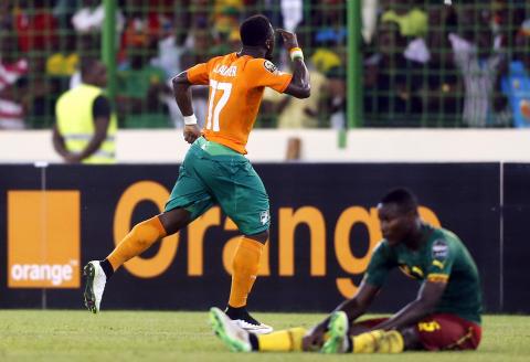 Serge Aurier of Ivory Coast celebrates after they won their 2015 African Cup of Nations Group D soccer match against Cameroon in Malabo, January 28, 2015. PHOTO BY REUTERS/Amr Abdallah Dalsh