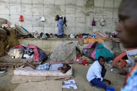 African migrants take shelter under the bridge of a motorway on the outskirts of Algiers, Algeria, June 28, 2017. PHOTO BY REUTERS/Zohra.Bensemra