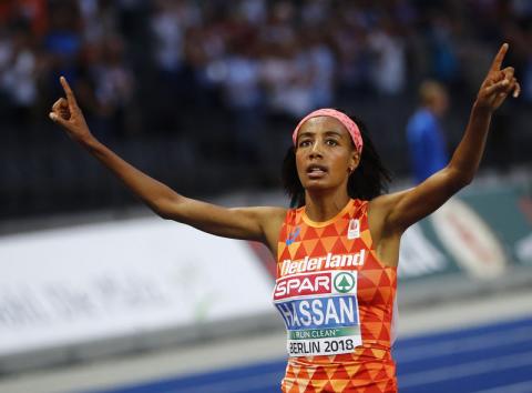 Sifan Hassan of the Netherlands celebrates winning gold medal. PHOTO BY REUTERS/Kai Pfaffenbach