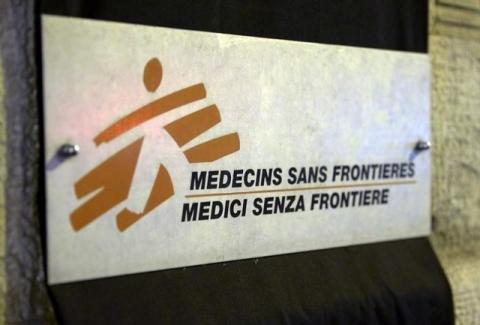 A sign is pictured over a black sheet outside the Medecins Sans Frontieres (MSF) headquarters in Geneva, Switzerland, October 7, 2015. PHOTO BY REUTERS/Denis Balibouse