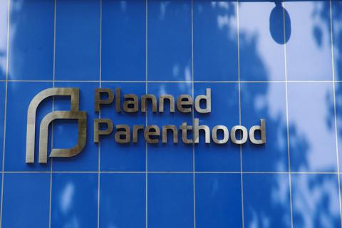 A sign is pictured at the entrance to a Planned Parenthood building in New York, August 31, 2015. PHOTO BY REUTERS/Lucas Jackson