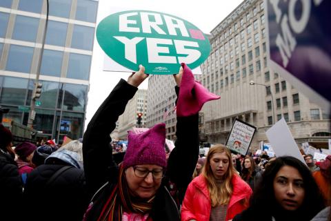 A demonstrator holds a sign calling for an equal rights amendment (ERA) during in the Third Annual Women's March at Freedom Plaza in Washington, U.S., January 19, 2019. PHOTO BY REUTERS/Joshua Roberts