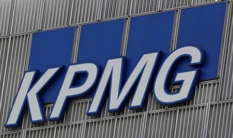 The KPMG logo is seen at their offices at Canary Wharf financial district in London, Britain, March 3, 2016. PHOTO BY REUTERS/Reinhard Krause