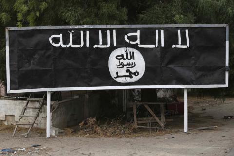 A signpost painted by Boko Haram is seen in the recently retaken town of Damasak, Nigeria, March 18, 2015. PHOTO BY REUTERS/Emmanuel Braun