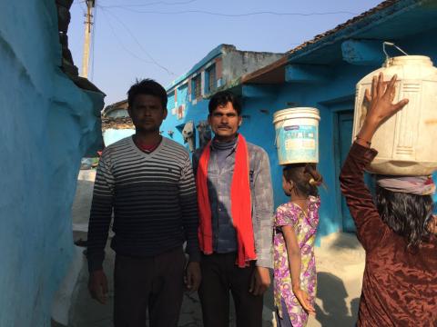 Jagdish Ahirwal (R) stands with a friend in Sunwaha village of Madhya Pradesh, India, December 12, 2018. PHOTO BY Thomson Reuters Foundation/Roli Srivastava