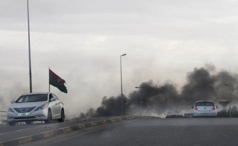 Smoke rises during heavy clashes between rival factions in Tripoli, Libya, May 27, 2017. PHOTO BY REUTERS/Hani Amara