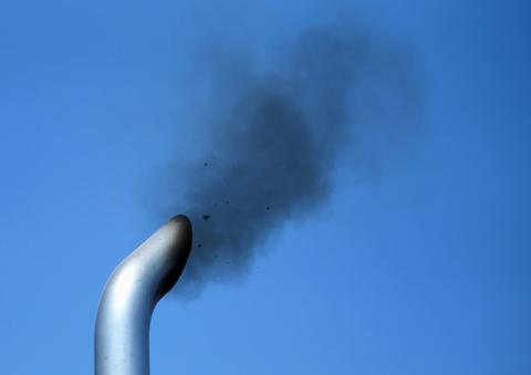 A truck engine is tested for pollution exiting its exhaust pipe as California Air Resources field representatives (unseen) work a checkpoint set up to inspect heavy-duty trucks traveling near the Mexican-U.S. border in Otay Mesa, California, September 10, 2013. PHOTO BY REUTERS/Mike Blake