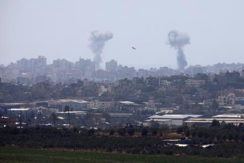 Smoke rises following an Israeli air strike in the Gaza Strip, as seen from the Israeli side of the border between Israel and Gaza, May 29, 2018. PHOTO BY REUTERS/Amir Cohen
