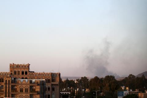 Smoke billows near military barracks in the Jabal al-Jumaima mountain following an air strike near Sanaa, March 30, 2015. PHOTO BY REUTERS/Mohamed al-Sayaghi