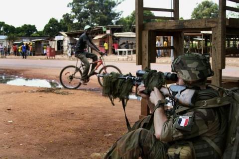 A French military sniper readies his rifle in Bangui, December 8, 2013. PHOTO BY REUTERS/Herve Serefio