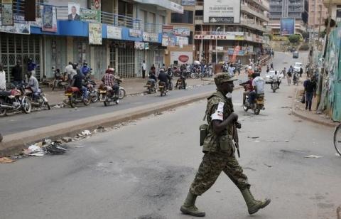 An Ugandan soldier patrols a street in Kampala, Uganda, February 20, 2016. PHOTO BY REUTERS/Goran Tomasevic