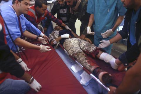 A Libyan military personnel, injured during clashes, receives medical treatment at the Benghazi Medical Center in Benghazi December 22, 2014. PHOTO BY REUTERS/Esam Omran Al-Fetori