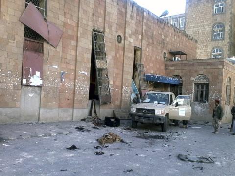 A soldier is seen outside a cultural centre following a suicide attack in Ibb, central Yemen, December 31, 2014. PHOTO BY REUTERS/Stringer