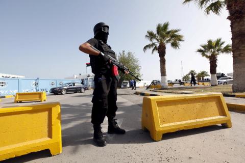 A member of the force assigned to protect Libya's unity government stands at the entrance to where the government has their offices, in Tripoli, Libya, April 14, 2016. PHOTO BY REUTERS/Ismail Zitouny