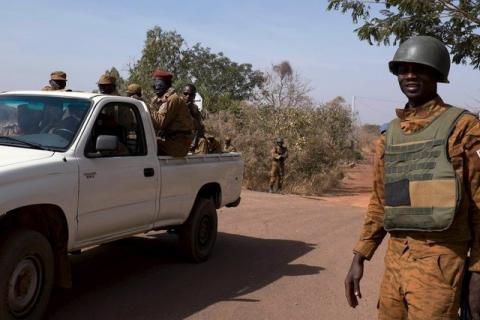 Soldiers stand outside an arms depot in Yimdi, Burkina Faso, January 22, 2016. PHOTO BY REUTERS/Nabil El Hadad