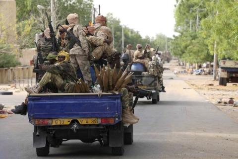 Chadian soldiers drive in the recently retaken town of Damasak, Nigeria, March 18, 2015. PHOTO BY REUTERS/Emmanuel Braun