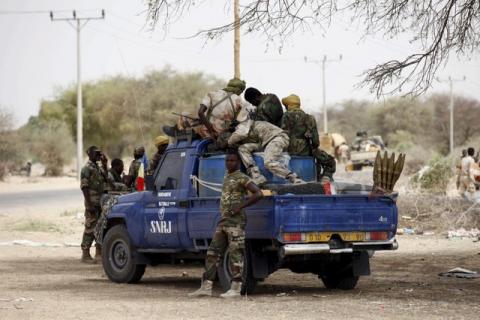 Chadian soldiers sit in a military pickup truck in Damask, March 24, 2015. PHOTO BY REUTERS/Joe Penney