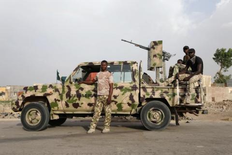 Nigerian soldiers are seen during a patrol at the Banki IDP camp in Borno, Nigeria, April 26, 2017. PHOTO BY REUTERS/Afolabi Sotunde