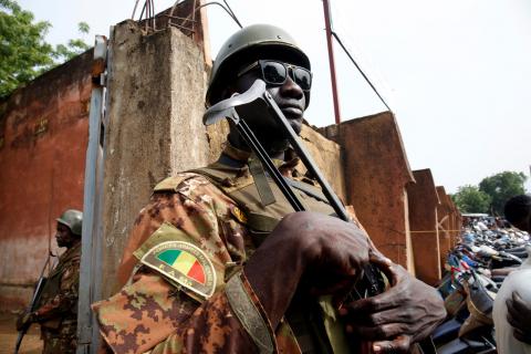 Soldiers secure the route as Ibrahim Boubacar Keita, President of Mali and candidate for the Rally for Mali party (RPM), is driven away after casting his vote for the presidential election in Bamako, Mali July, 29 2018. PHOTO BY REUTERS/Luc Gnago